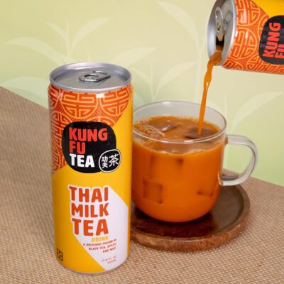 kft thai and brown sugar milk tea being poured in a mug